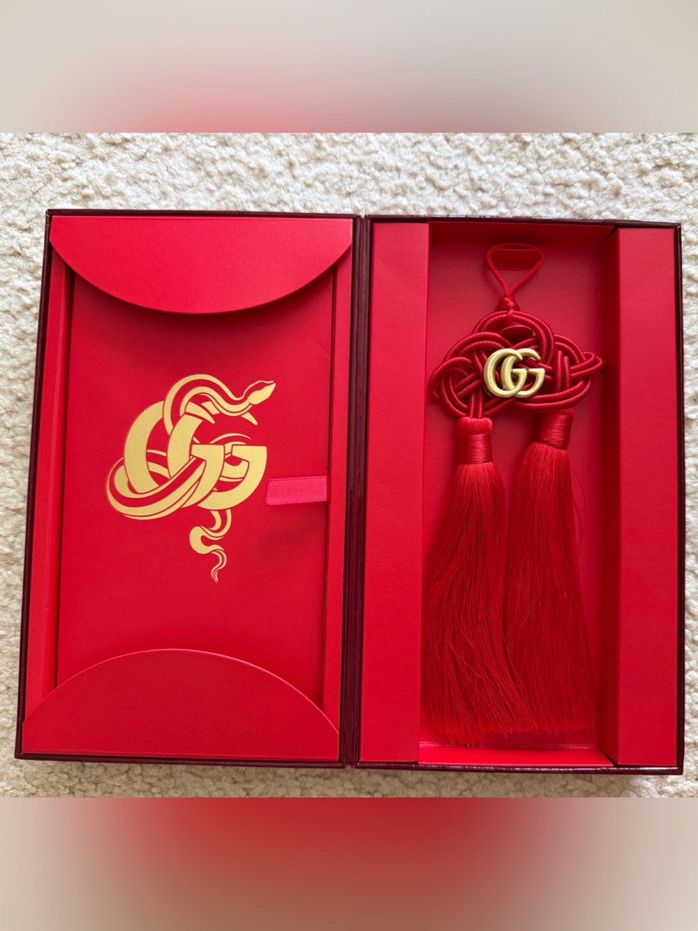 Gucci Chinese New Year box with red envelopes